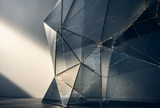 Fractured geometric structure representing hidden financial exposure in a high net worth estate