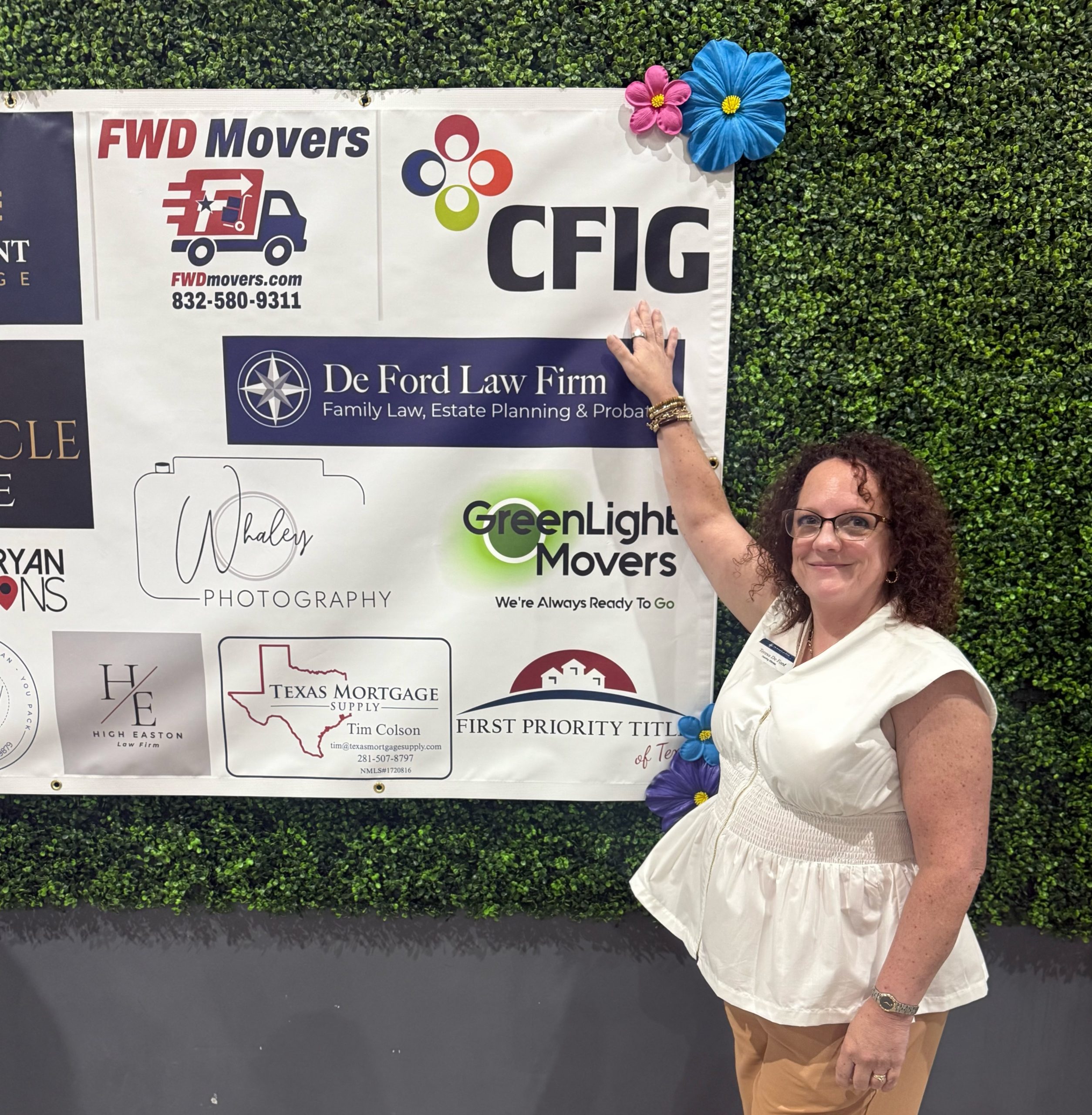 Professionals collaborating during a DeFord Law Firm community event